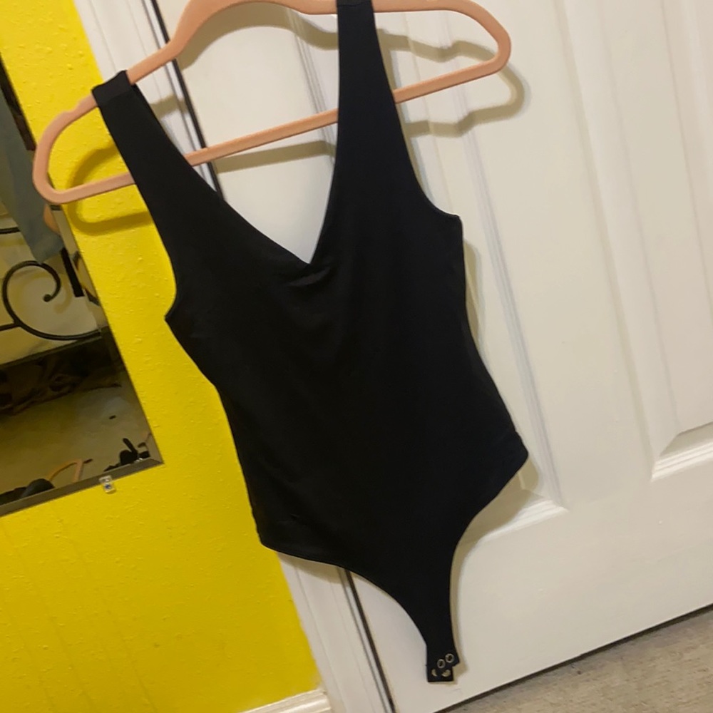 Black sleeveless body suit